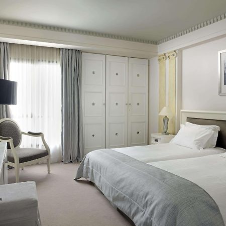 Njv Athens Plaza Hotel Bilik gambar A room at the Hotel de la Paix