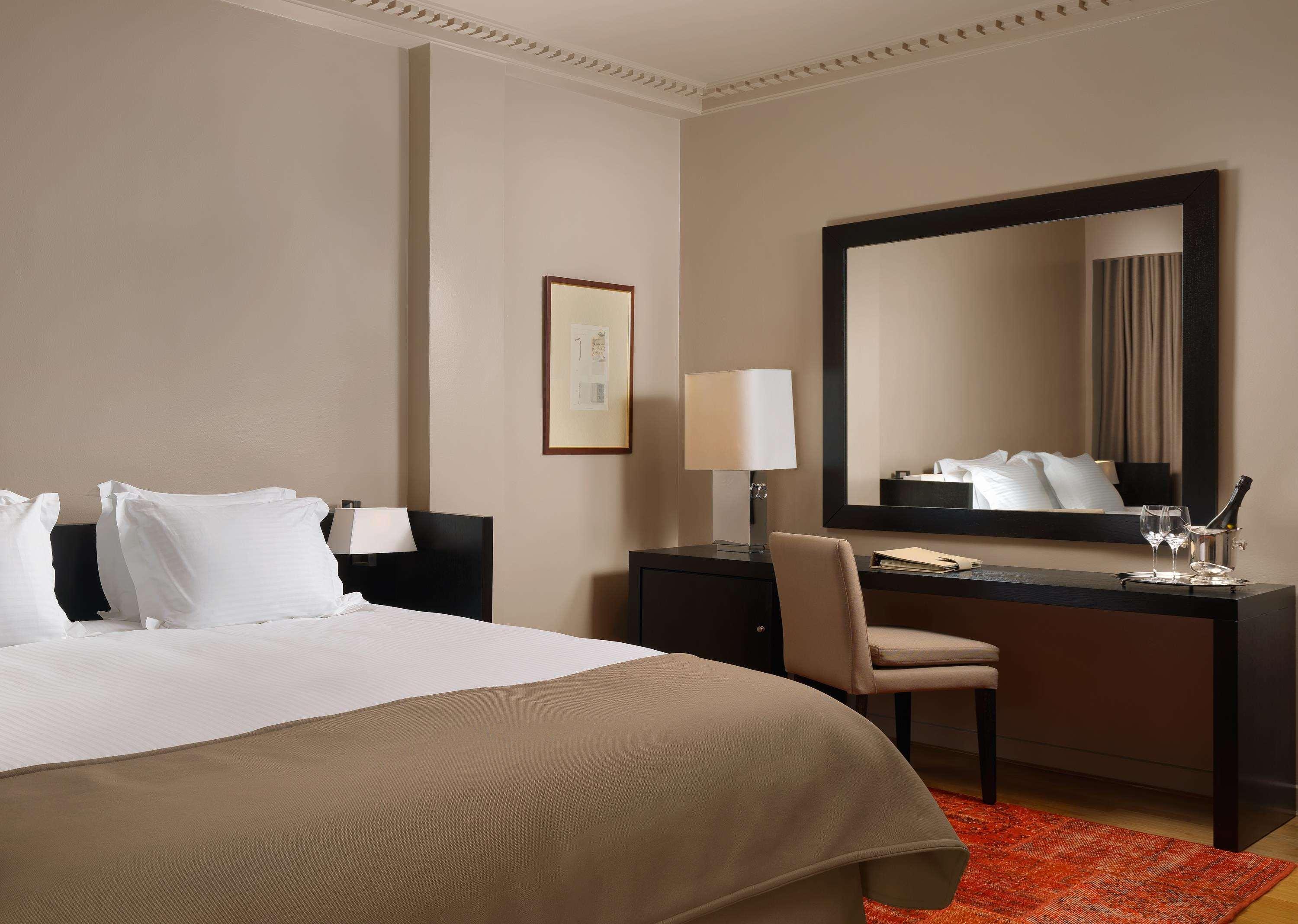 Njv Athens Plaza Hotel Bilik gambar A bedroom at the hotel