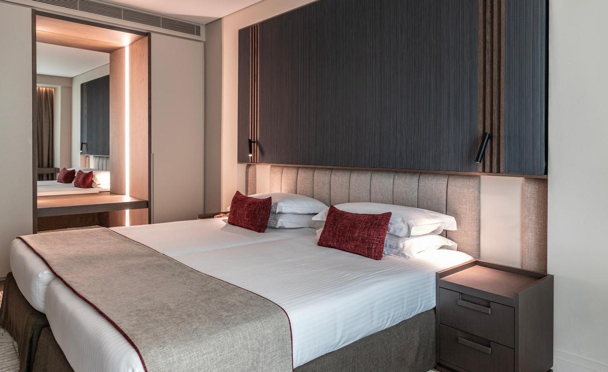 Njv Athens Plaza Hotel Luaran gambar A bedroom at the hotel